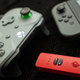Illustration for article titled This Red Little Devil of a USB Stick Allows Any Controller on Nintendo Switch and Makes iPokémon Sword/i iand Shield /iTen Times Easier
